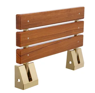 ספסל עץ טיק מלא לישיבה במקלחת מיועד לחדרים רטובים רוחב 51 ס"מ ומיועד לתליה על הקיר במקלחת מתקפל צבע פרזול זהב מט אל חלד דגם פלורנה